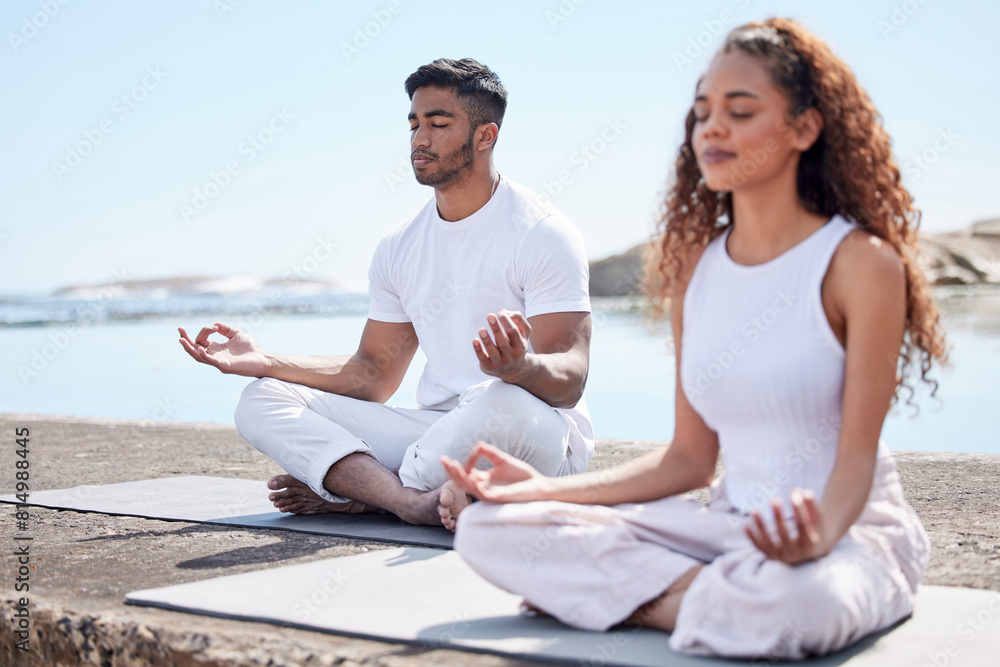 Couple, man and woman in beach for meditation, mindfulness and holistic wellness outdoor. People, guy and lady with zen for bonding in California to relax, peace and mental health in relationship Couple, man and woman in beach for meditation, mindfulness and holistic wellness outdoor. People, guy and lady with zen for bonding in California to relax, peace and mental health in relationship