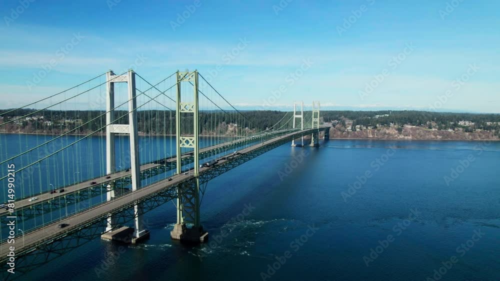 Beautiful Blue Sky Drone Shot of Tacoma Narrows Bridge Crossing Puget Sound Beautiful Blue Sky Drone Shot of Tacoma Narrows Bridge Crossing Puget Sound
