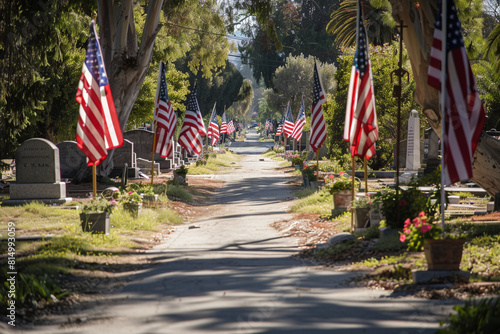 U.S. flags lining a path of honor at Los Angeles Cemetery for Memorial Day preparation. photo