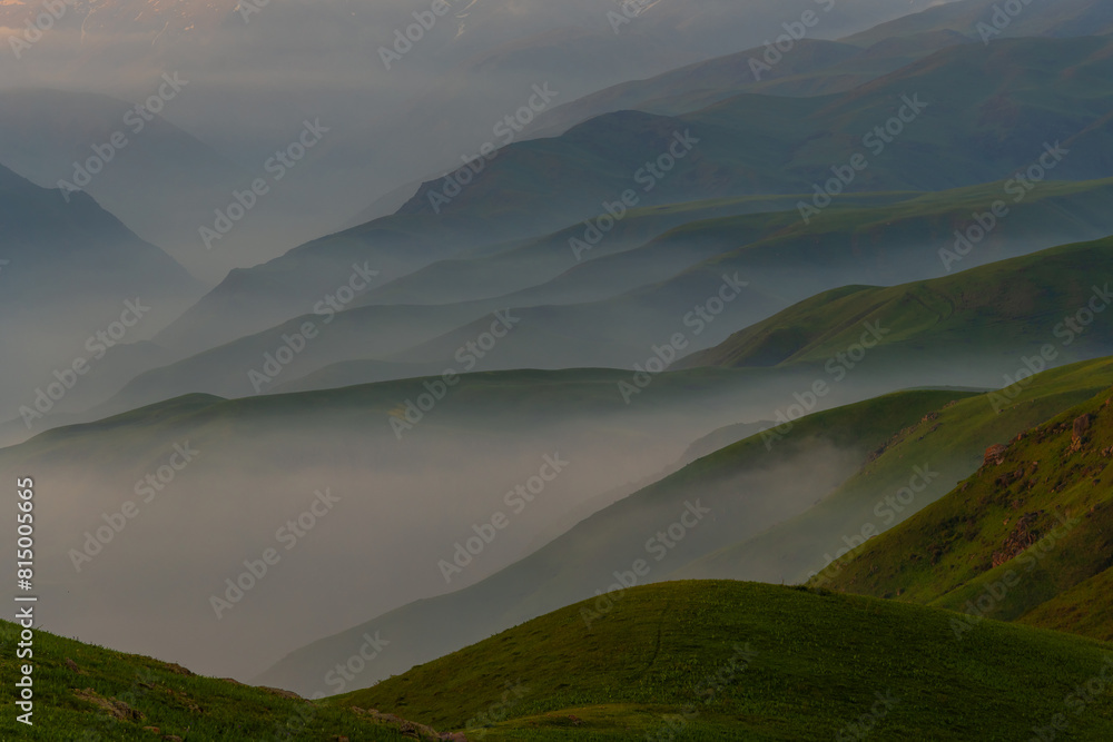 Obraz premium Picturesque high mountain plateau with fog in Almaty region (Kazakhstan)