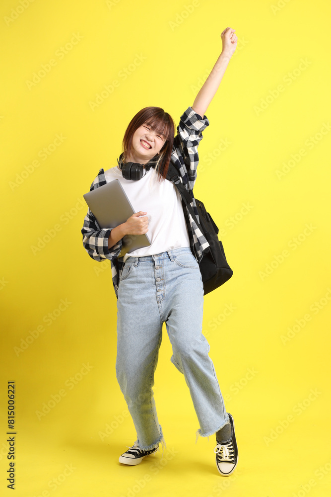 Naklejka premium 20s Asian college student