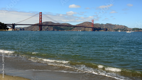 San Francisco Bay and East Beach in background of Golden Gate Bridge on sunny day. San Francisco, California