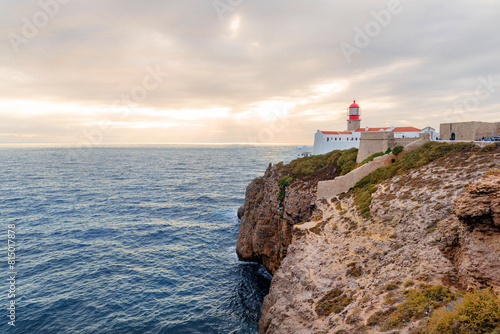 lighthouse on the high cliffs of Cape St. Vincent. The most southwestern point of mainland Europe. natural landscape of the Atlantic Ocean, rocky coast at Cabo de Sao Vicente in the Algarve, Portugal