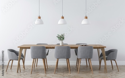 Minimalist dining setup with wooden table and grey chairs.