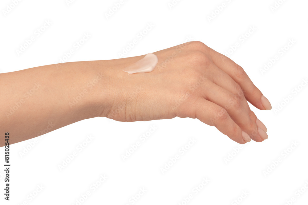 Beige cream tube in woman hands isolated on a white background. Cream swatch on woman hand. Beige cream tube in woman hands isolated on a white background. Cream swatch on woman hand.