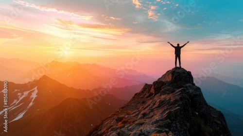 Atop a mountain peak at sunrise  a person raises their arms in victory  representing the fulfillment of personal goals and resolutions for 2025. 2025 new year resolutions