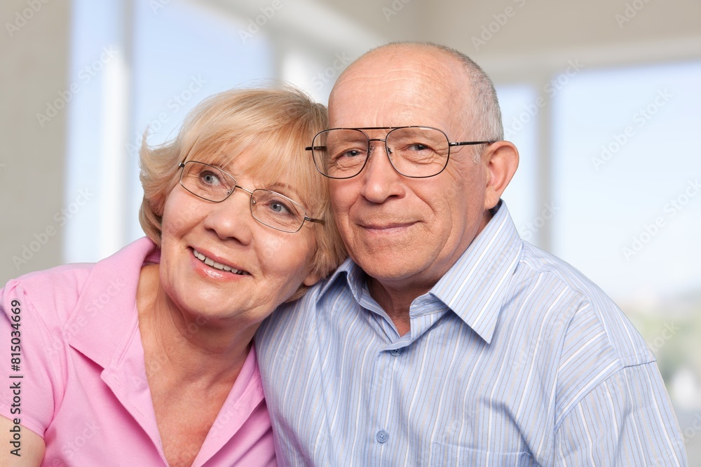 Happy loving senior couple standing at home Happy loving senior couple standing at home