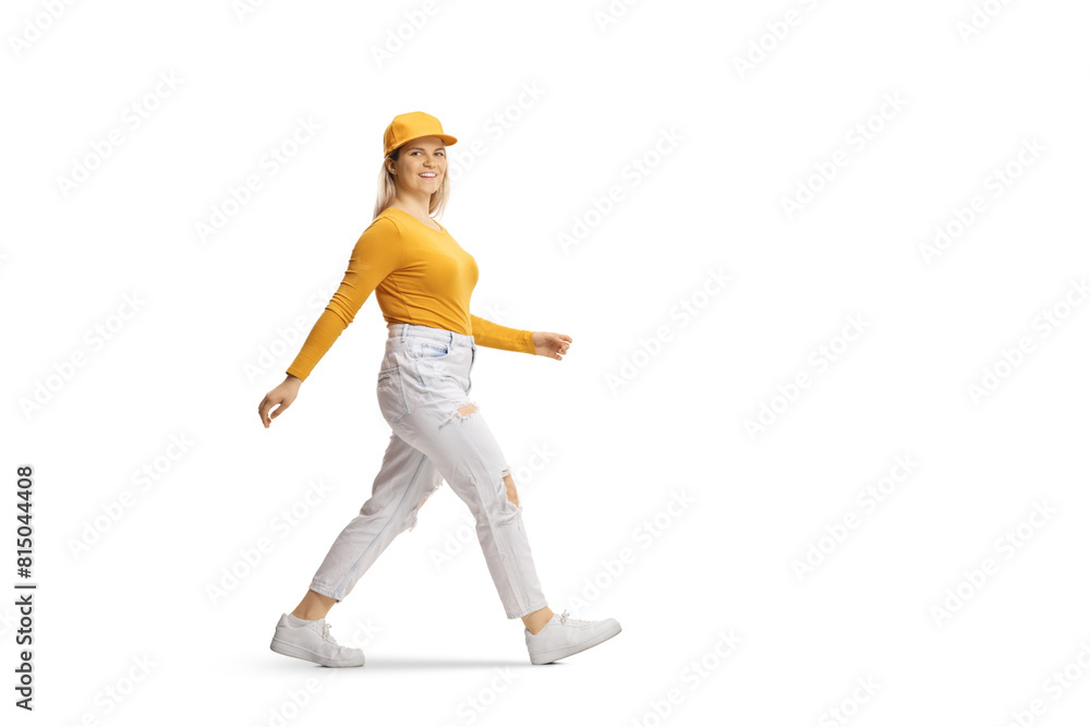 Full length shot of a happy young gen z female walking Full length shot of a happy young gen z female walking