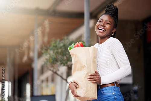 Obraz na plátne Bag, groceries and black woman for shopping, outside and vegetables for healthy food