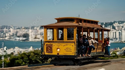Iconic San Francisco Cable Car Ascending a Hill with City and Bay Views