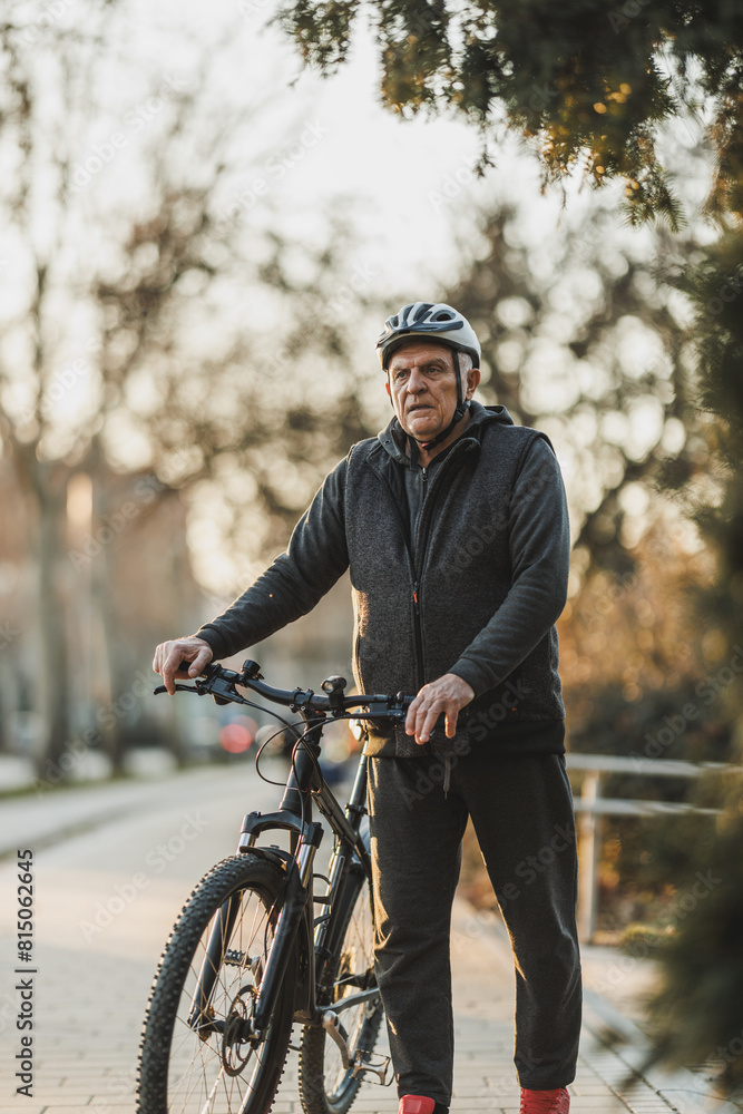 Man Standing Next to Bike on Sidewalk