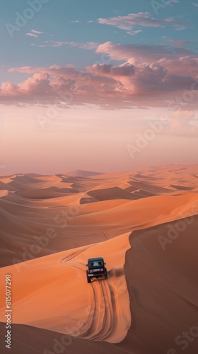 Truck Driving Through Desert With Sand Dunes