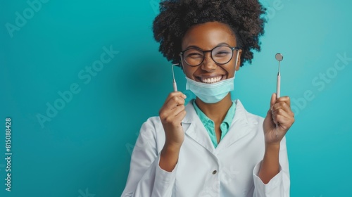 Happy Dentist with Dental Tools photo