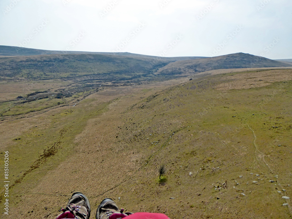 Fototapeta premium Paragliding above the Hills of Dartmoor in Devon