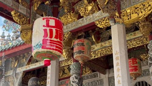 traditional Chinese lanters and gold leaf beams at Leong San Tong Khoo Kongsi temple clanhouse in George Town, Penang, Malaysia photo