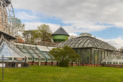 Berlin, Germany - 20 April 2024, Berlin botanical Gardens Greenhouse, historical building beautiful sky © elenarostunova