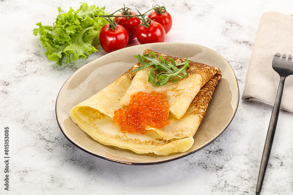 Russian pancake with red caviar Russian pancake with red caviar