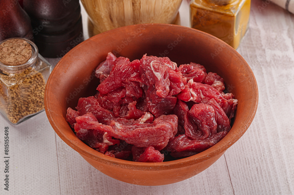 Raw beef meat - sliced strips Raw beef meat - sliced strips