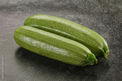 Raw green ripe zucchini vegetable