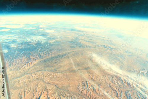 Earth s Surface Viewed from Space  Vast Desert and Blue Atmosphere