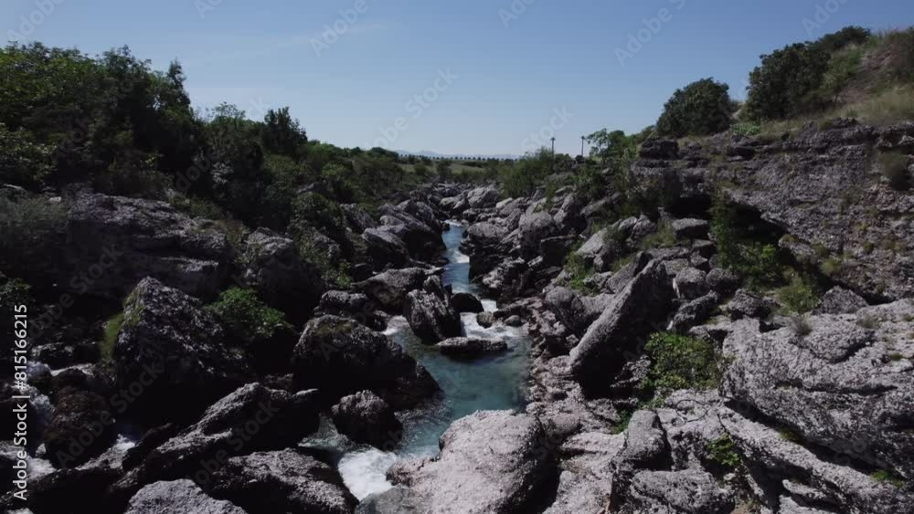 Aerial video of the Chibna River flowing swiftly through rock outcrops in Montenegro Aerial video of the Chibna River flowing swiftly through rock outcrops in Montenegro