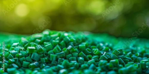 Green plastic granules. Polyethylene terephthalate (PET) biopolymer. Plastic for recycling. photo