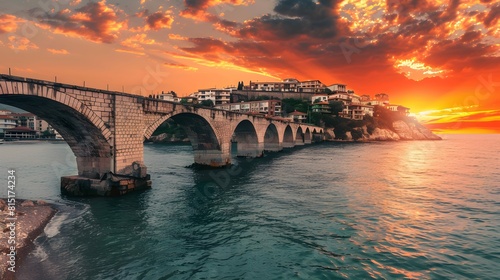Stunning summer sunrise in Kavala city with old viaduct on background, Macedonia, Greece, Europe. Colorfuk morning seascape of Aegean Sea. Traveling concept background photo