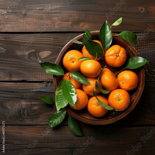 Fresh tangerines with green leaves, mandarins in bowl banner, oranges, clementines pile on wood table