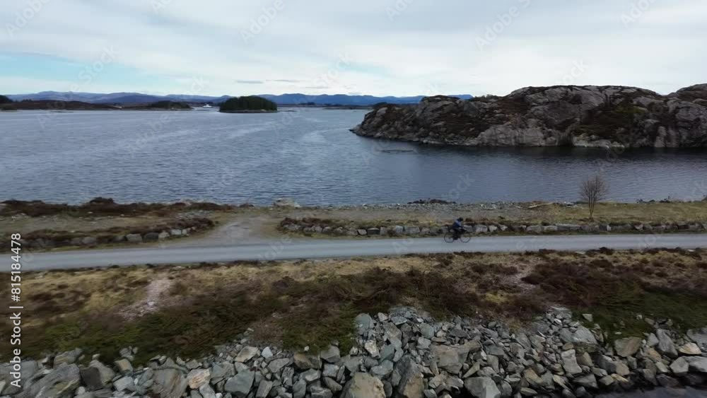A beautiful landscape in Norway with a view of the sea, mountains, and islands in sunny weather. A beautiful landscape in Norway with a view of the sea, mountains, and islands in sunny weather.