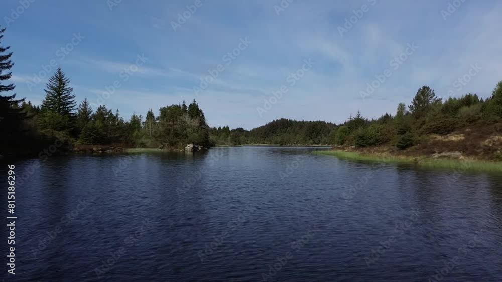 A beautiful landscape in Norway with a view of the sea, mountains, and islands in sunny weather. A beautiful landscape in Norway with a view of the sea, mountains, and islands in sunny weather.