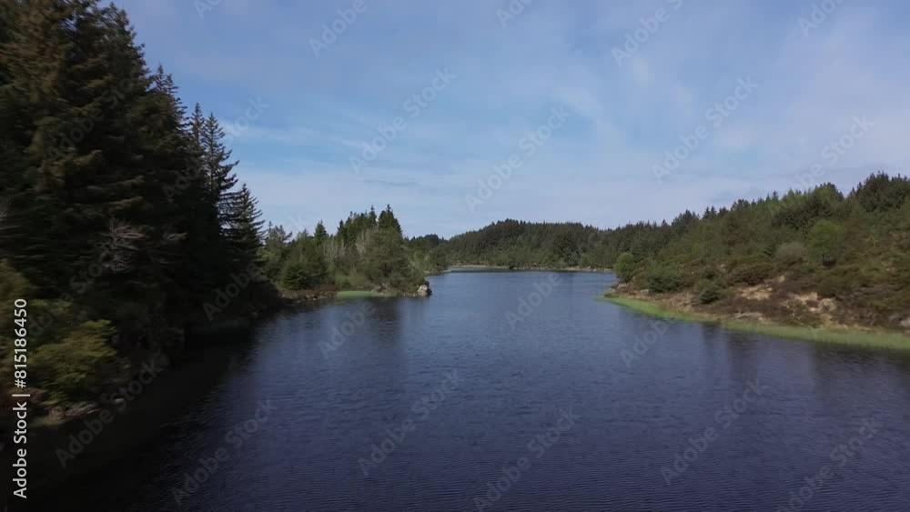 A beautiful landscape in Norway with a view of the sea, mountains, and islands in sunny weather. A beautiful landscape in Norway with a view of the sea, mountains, and islands in sunny weather.