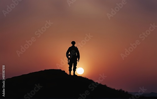 Memorial Day, A soldier stands atop a hill at sunset 