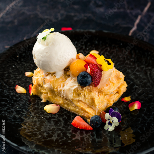 puff pastry cake with ice cream and fresh berries