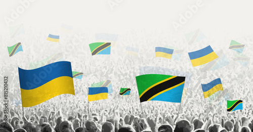 People waving flag of Tanzania and Ukraine, symbolizing Tanzania solidarity for Ukraine.