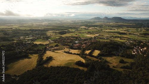 aerial view of the countryside between Els Masos de Pals Torroella de Montgrí and Castell del Montgrí of the hills behind, the Pyrenees at the horizon, evening light after a thunderstorm, Spain photo