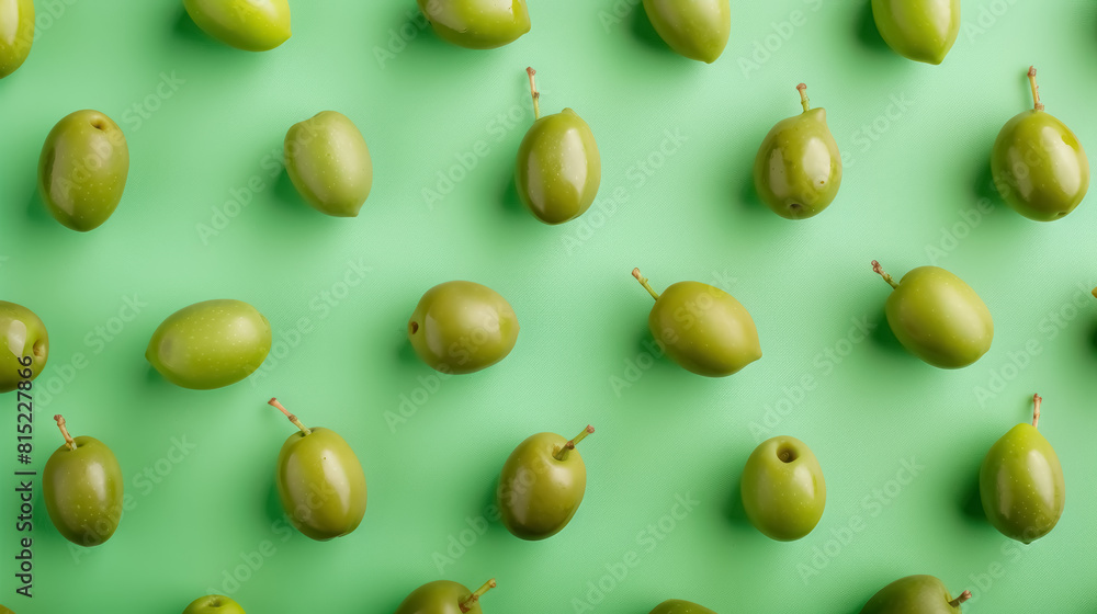 bright green olives pattern on a soft pastel green background bright green olives pattern on a soft pastel green background
