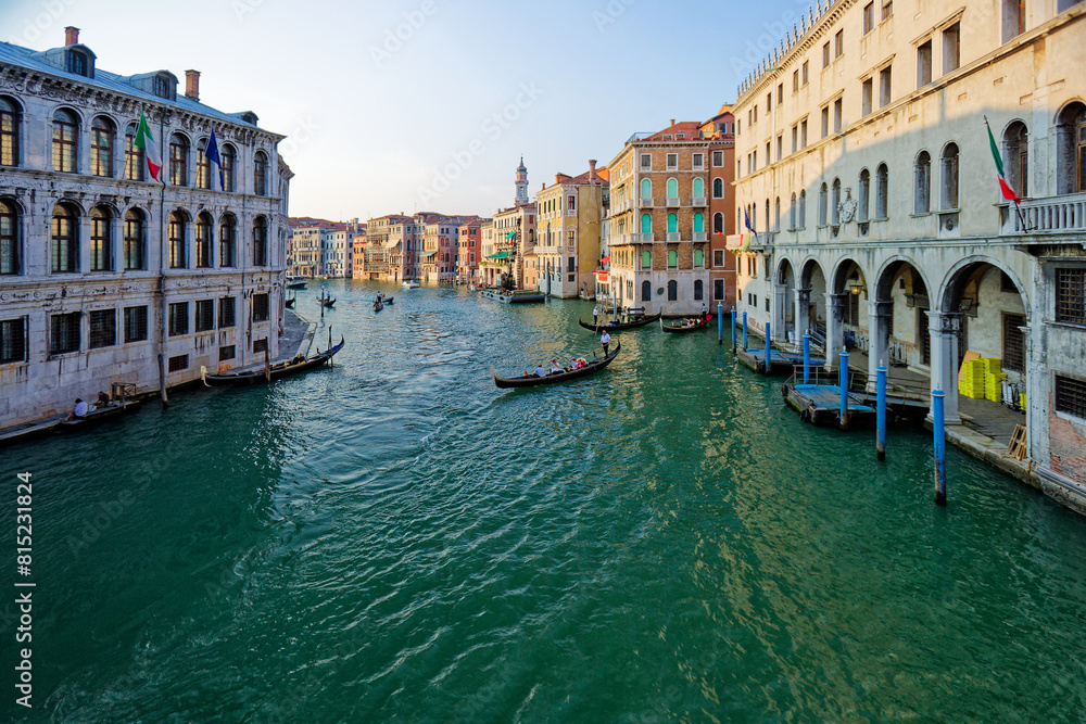 Fototapeta premium Grand Canal, Venice with View of the river and city historical architecture. with gondolas in Venice, Italy. in winter time.