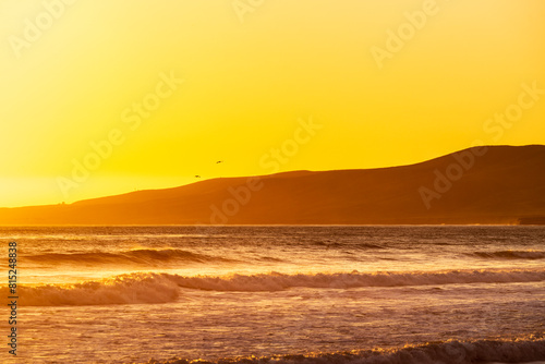 Yellow sunset over ocean, sky, beach, waves, ocean