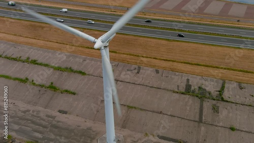 Aerial view of clean power generating wind turbines. photo