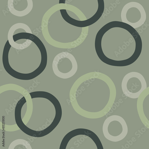 Seamless pattern, vector illustration. Sober fabric print, camouflage colors, military green. Organic shapes, polka dots. Stylish, elegant and formal. Circle, rounded, design decoration. Three colors.