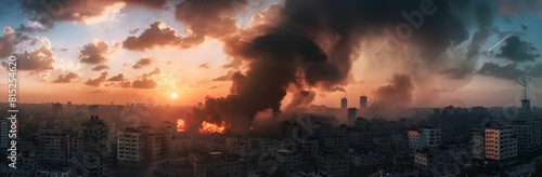 Black smoke and fire from an explosion in Gaza City  with a view of buildings on the horizon. A panoramic photo taken at sunset with a wide-angle len