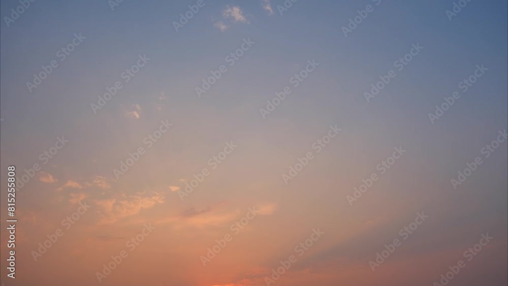 The fleeting beauty of dusk as the sky transforms into a canvas of vivid colors and billowing clouds. Time lapse magic. Loop of sky background. Sunset timelapse. 4K.
The fleeting beauty of dusk as the sky transforms into a canvas of vivid colors and billowing clouds. Time lapse magic. Loop of sky background. Sunset timelapse. 4K.