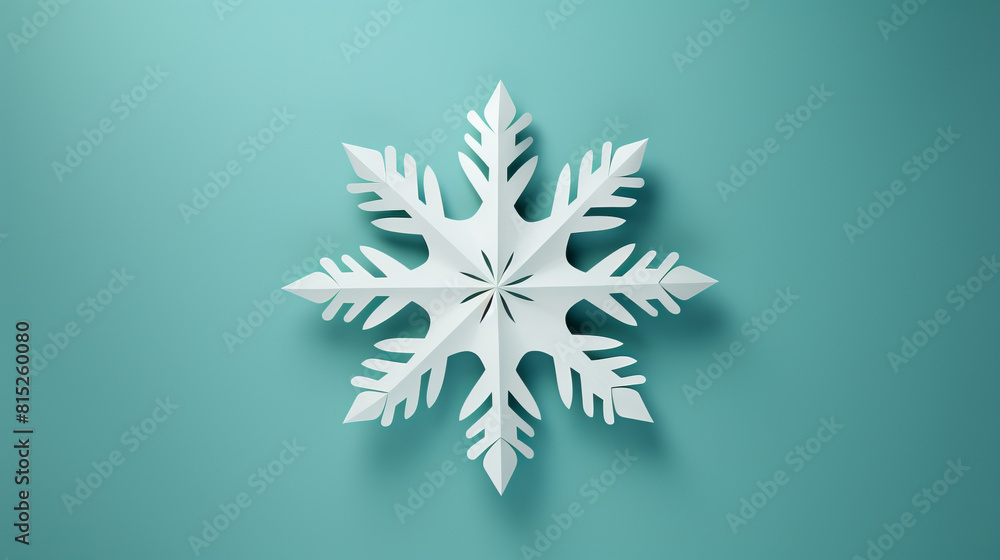 A white snowflake is on a blue background A white snowflake is on a blue background