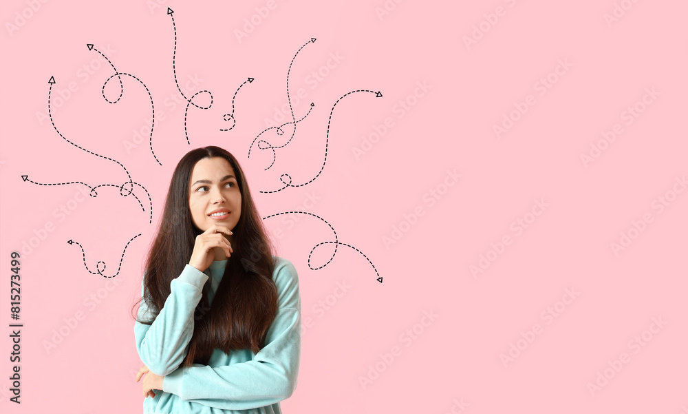 Dreaming young woman on pink background