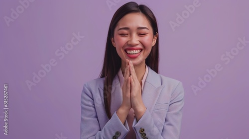 Joyful Asian businesswoman radiating warmth, clasping hands with a beautiful American counterpart, against a backdrop of soft lavender purple