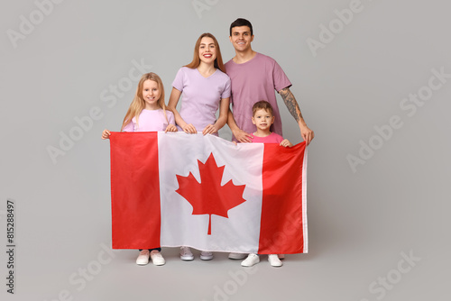 Happy family with flag of C...