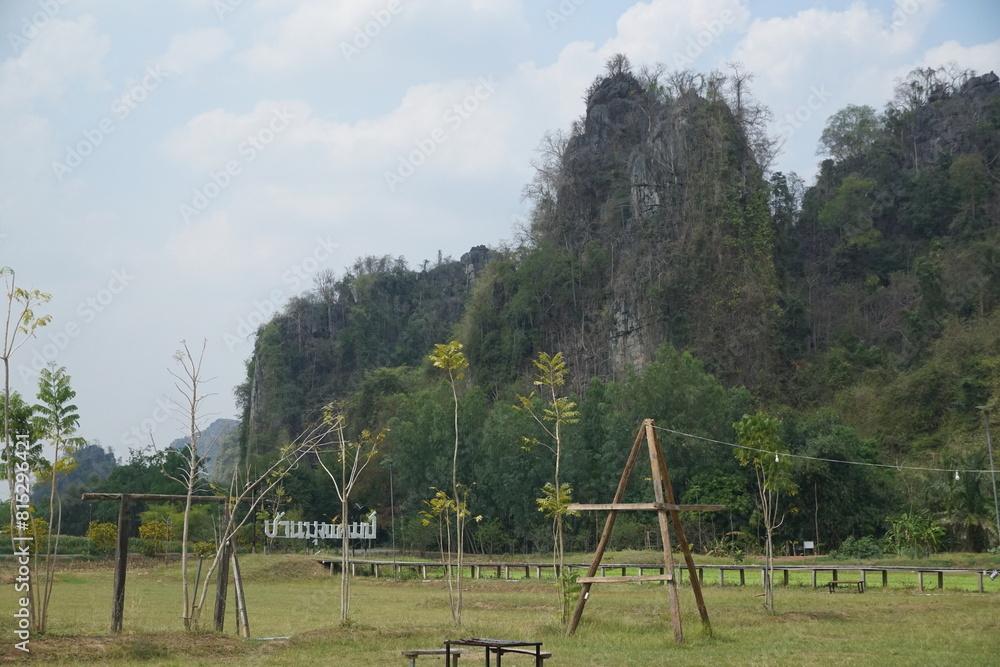 A mountain range with a sign that says A mountain range with a sign that says