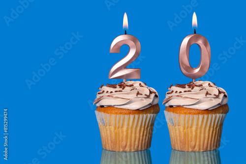 Birthday Cupcakes With Candles Lit Forming The Number 20.