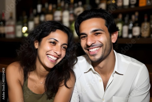 a cuban male and female COUPLE dating, married, 30s, laughing, nightclub bar, candid