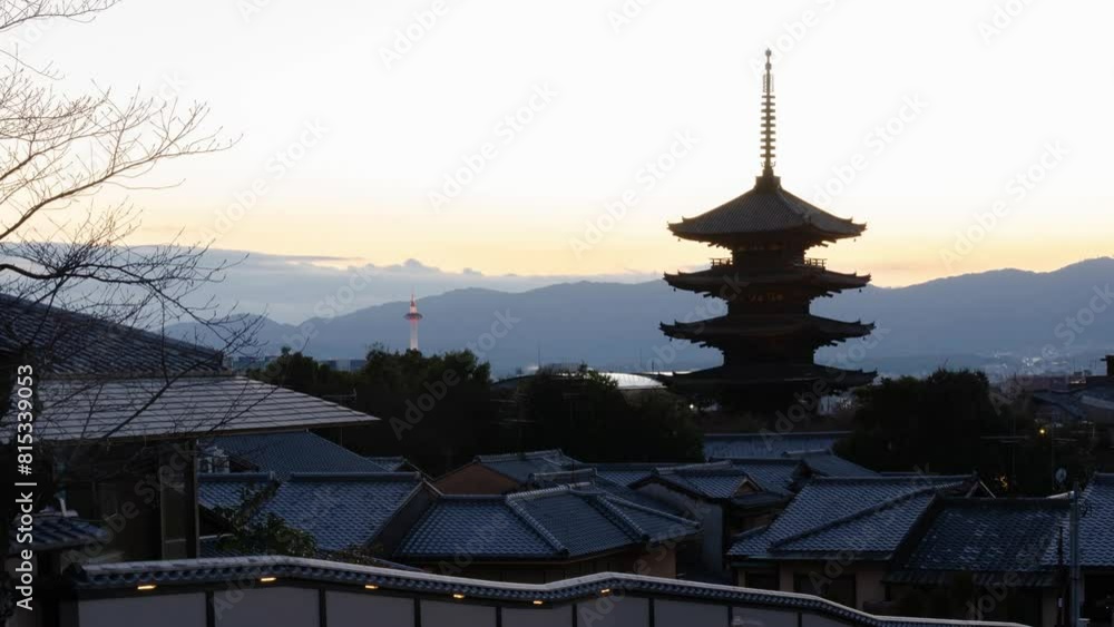 timelapse kyoto city aerial skyline view to ancient Yasaka pagoda building and Kyoto Tower at the back in higashiyama, Kyoto old town with sunset sky timelapse kyoto city aerial skyline view to ancient Yasaka pagoda building and Kyoto Tower at the back in higashiyama, Kyoto old town with sunset sky